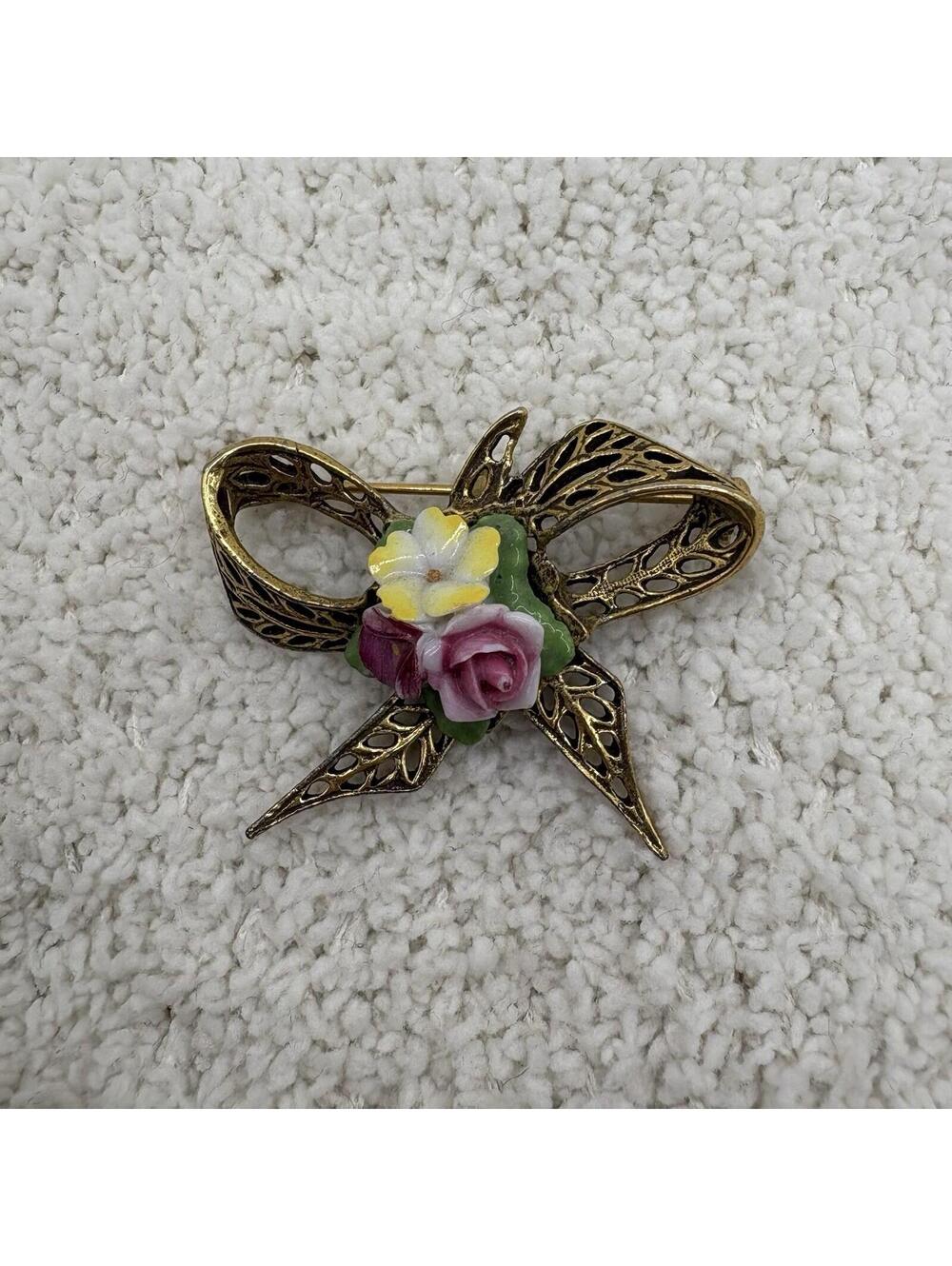 Vintage Gold Tone Filigree Bow Brooch Porcelain Flower Center